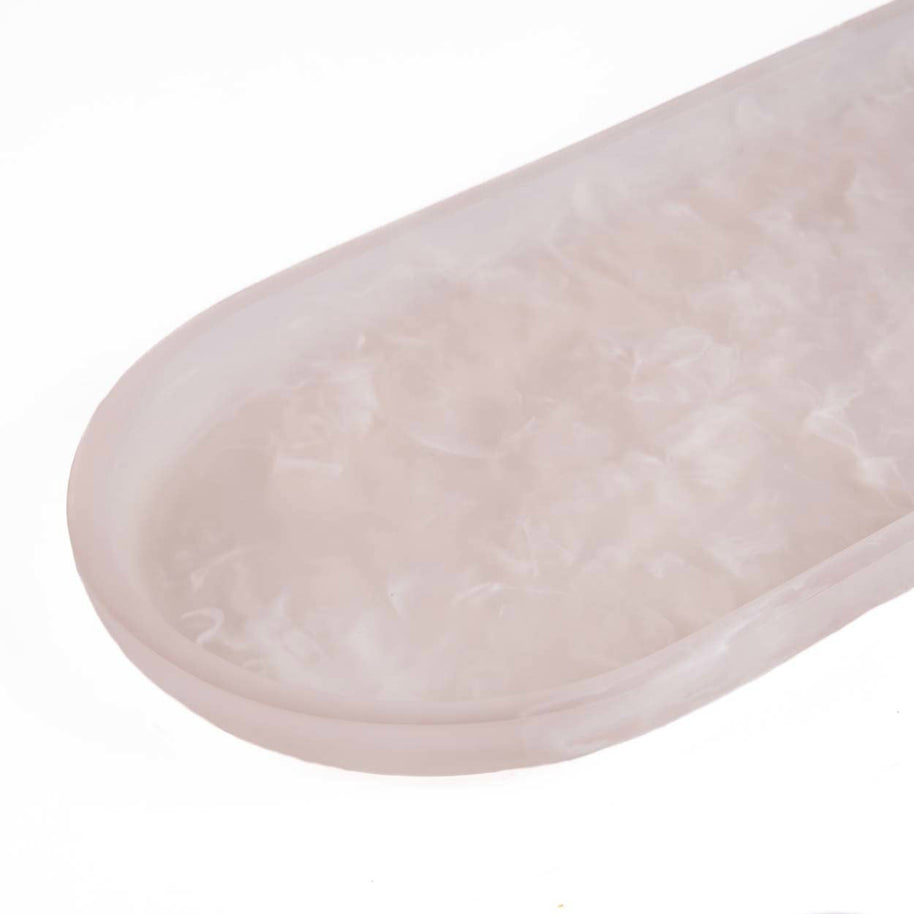Het ovale bord van hars - roze-wit