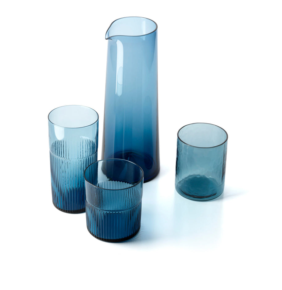 De azuurkleurige gehamerde hoge tumbler - blauw